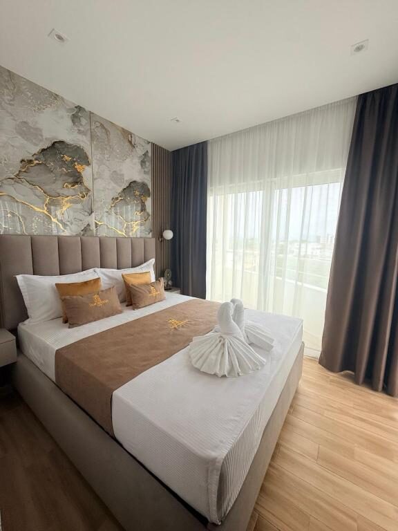 Apartment bedroom with terrace access